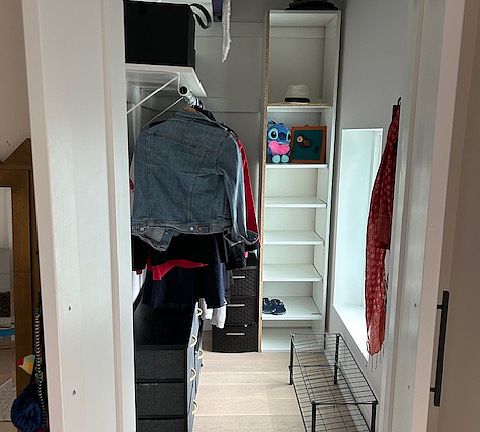 This is the walking closet. Items in the picture will be removed, once the person moves in