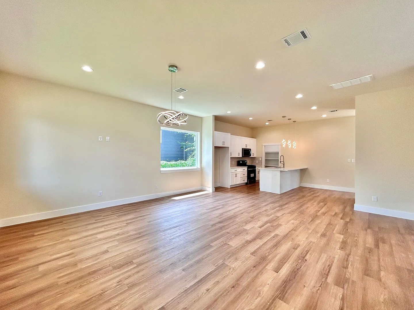 Modern 3/BR 2.5/BA Home with Stylish Finishes and Natural Light! — Photo 4