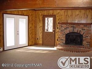 Livingroom with Brick Fireplace