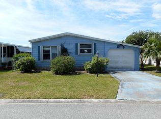 415 Kumquat Dr, Barefoot Bay, FL 32976