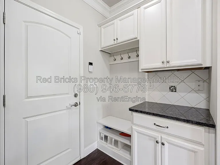 9659 Camberley Ave NW — Photo 17