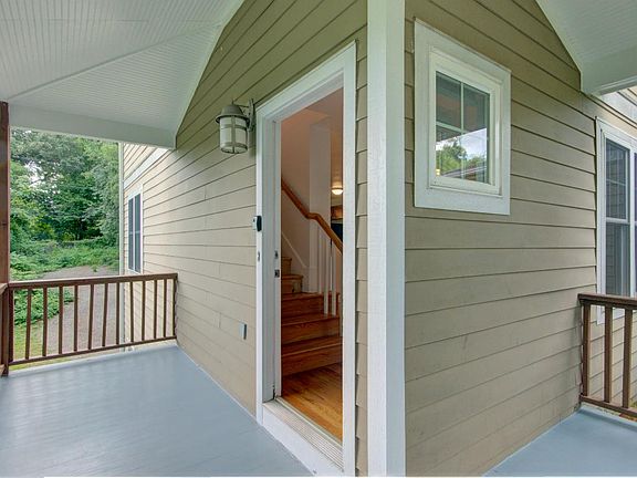 The entry to the main level is from the front porch.