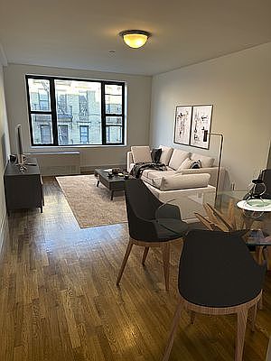 1st image of 410 W 48th St APT 32