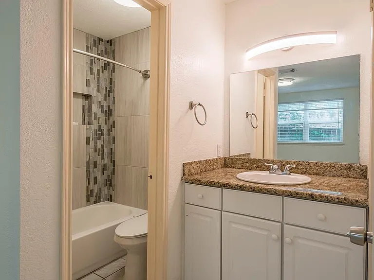 13402 T C Jester Blvd — Photo 9