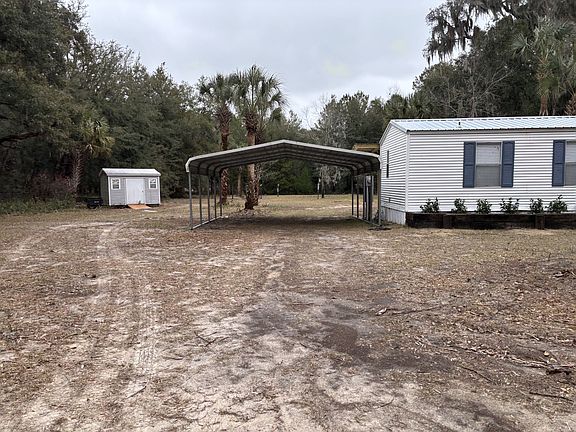 Two Car Carport and Storage Shed