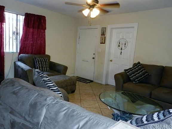 Large Ceramic Tile Flooring and Ceiling Fan