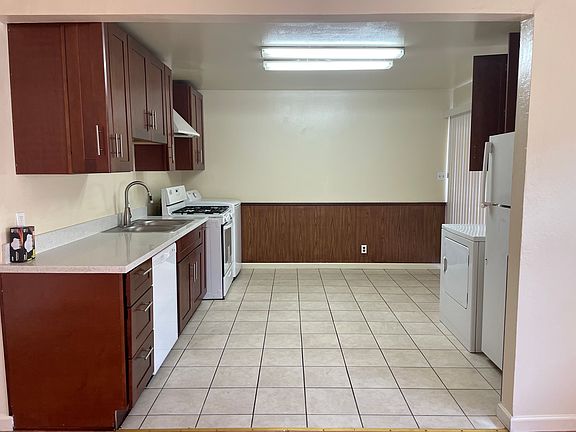 New paint, refrigerator, blinds.