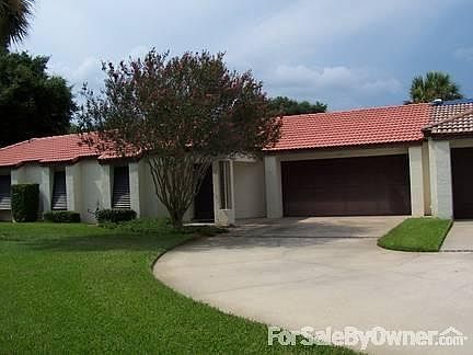 front of home
						:
						block & stucco, clay tile roof