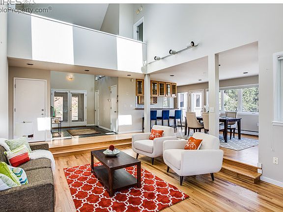 Living Room Opens to Dining