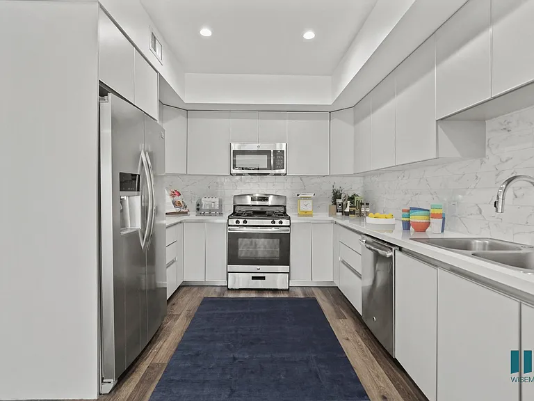 Full-Size Kitchen with Energy-Effcient Appliances and Ample Cabinet Storage
