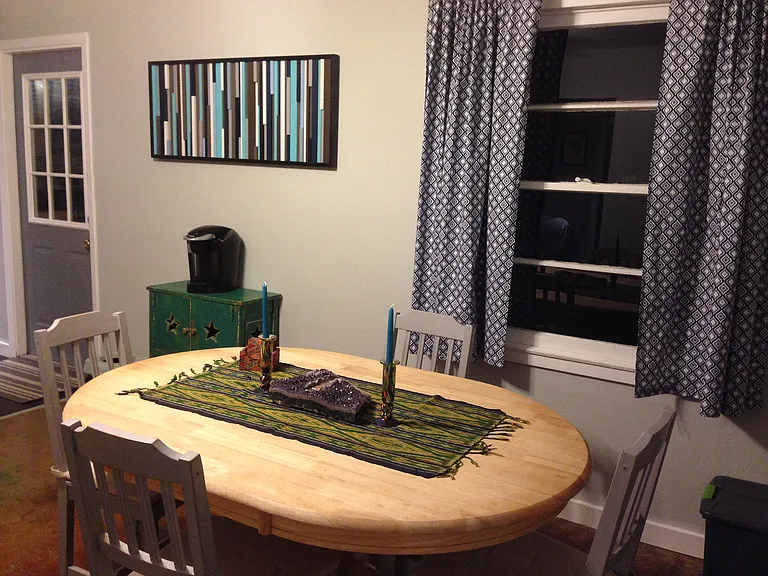 Dining table area and exterior door to deck