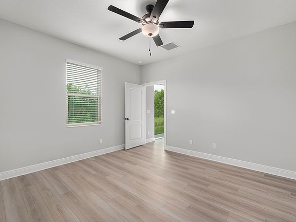 Master bedroom with vinyl flooring