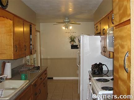 Galley kitchen with eat-in area