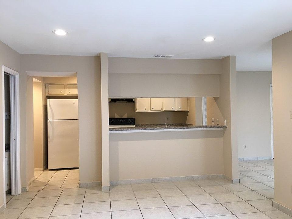 Kitchen, living room and half bathroom