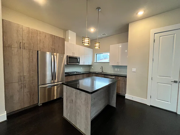 Italian design kitchen with all matching appliances and gas range. Half bath.