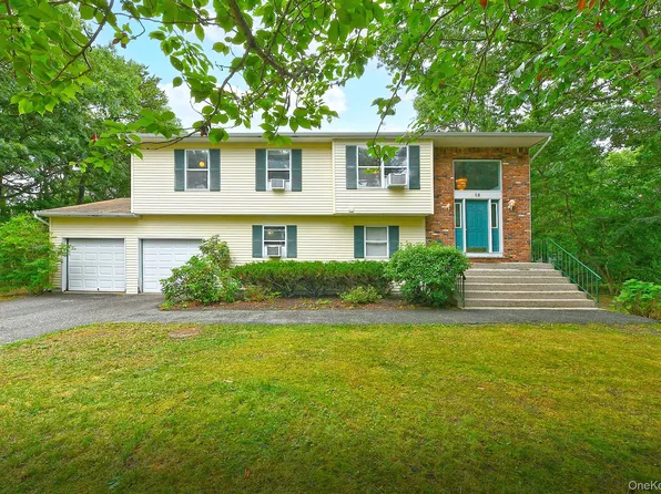 10 Woodbrook Circle, Holtsville, NY 11742