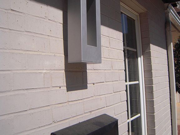 front entry way by 63 street next to garage