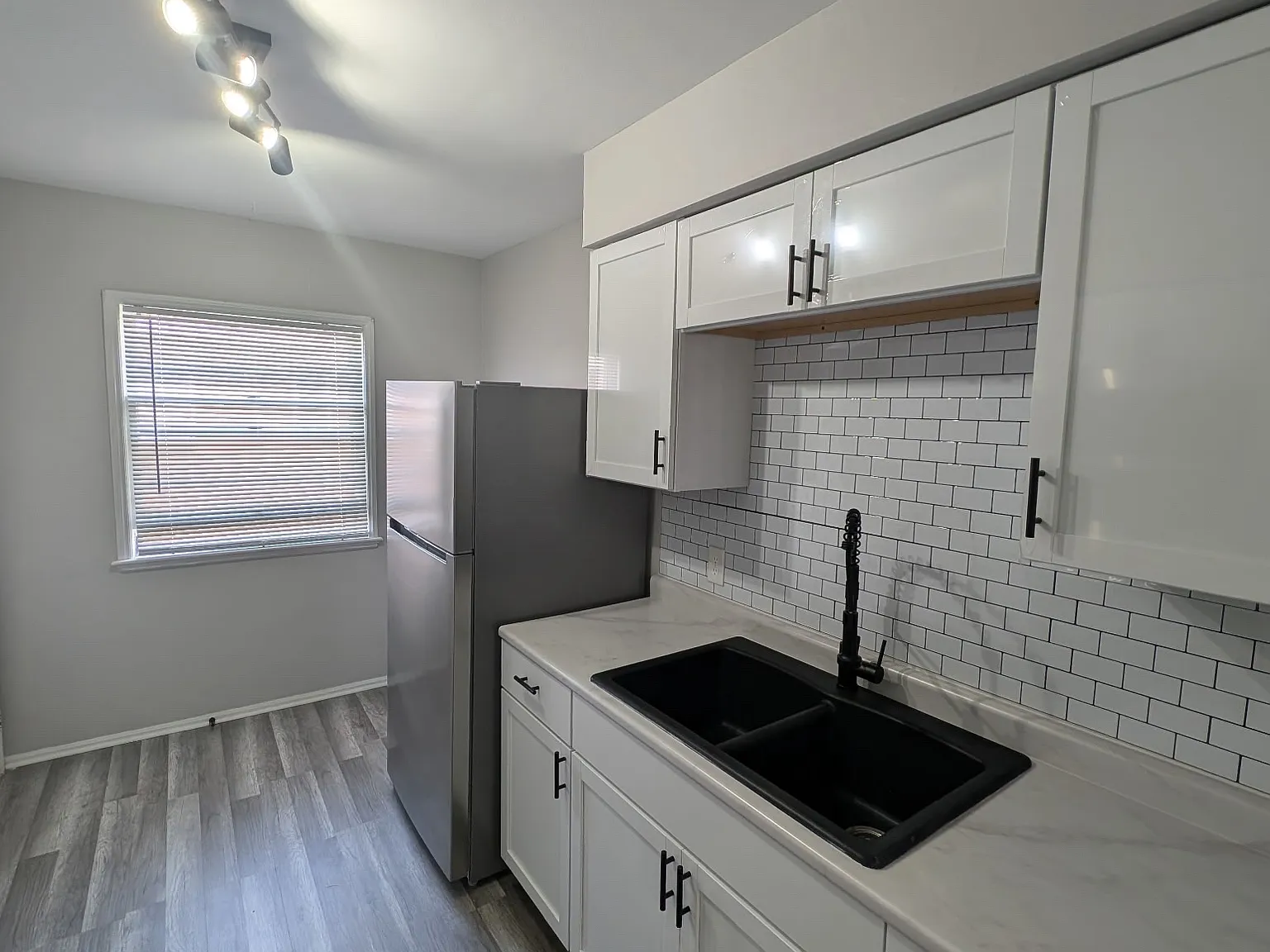 3355 Warren Rd — Photo 3