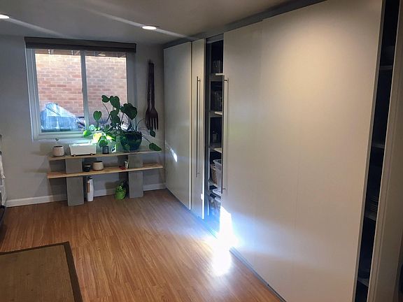 large pantry with barn door sliders