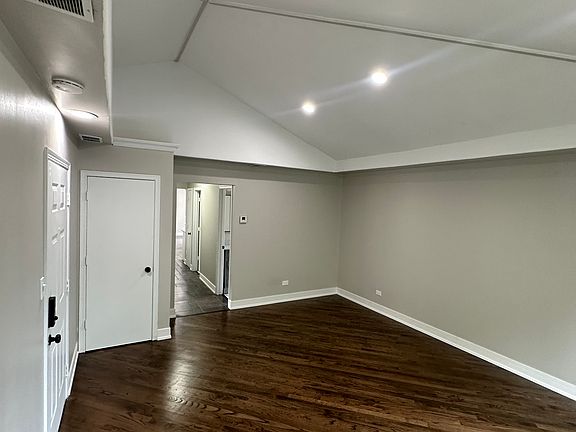 front living room with cathedral ceilings