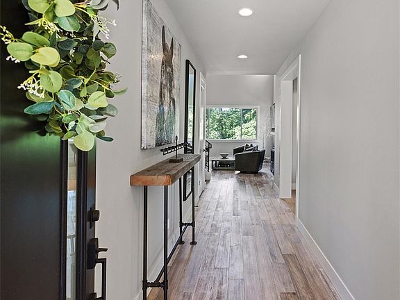 Welcome home!  Stunning grey solid hardwood floors throughout main floor.  