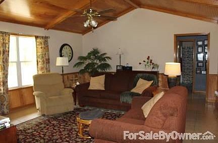 Living room with vaulted ceiling