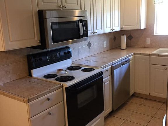 Kitchen (includes stove, microwave and dishwasher)