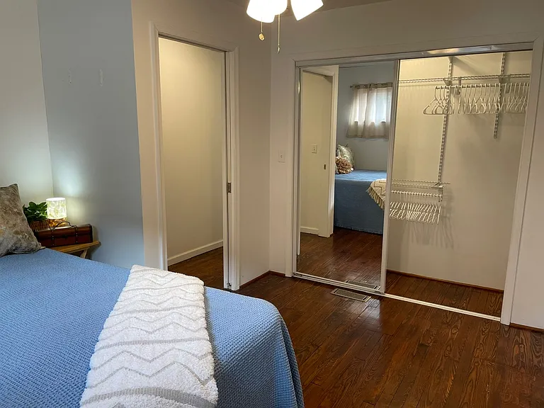 Spacious Closet w/ Mirrored Doors