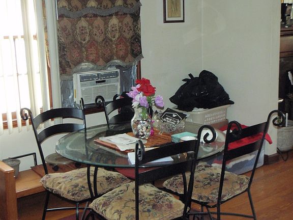 Formal Dining Room with wood floors.
