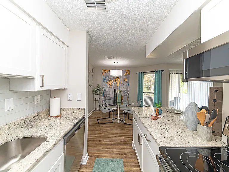 Kitchen with granite counters and stainless appliances