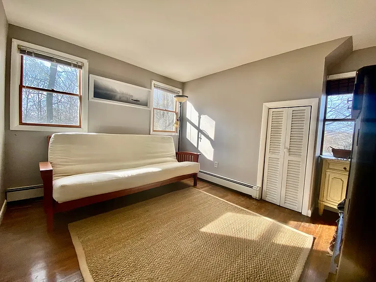 Second bedroom on second story overlooking back field, with seasonal Catskills views.