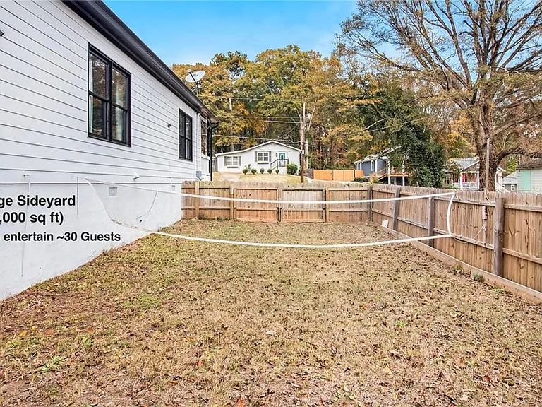 Shared Space - Side
yard - Perfect for soccer, volleyball, badminton, etc.