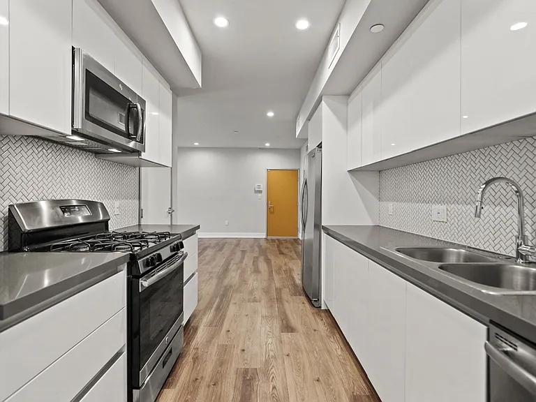 Kitchen with Energy-Efficient Appliances and Ample Cabinet Storage
