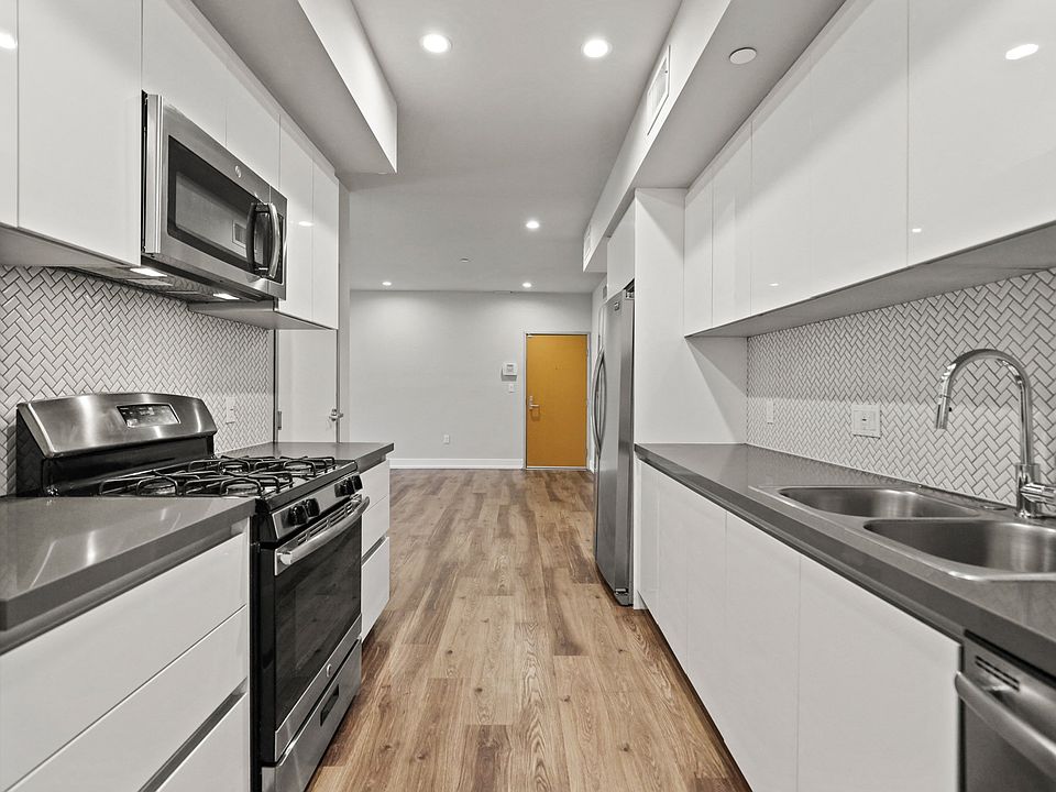 Kitchen with Energy-Efficient Appliances and Ample Cabinet Storage