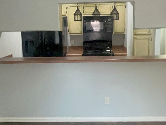 Looking from dining room to kitchen