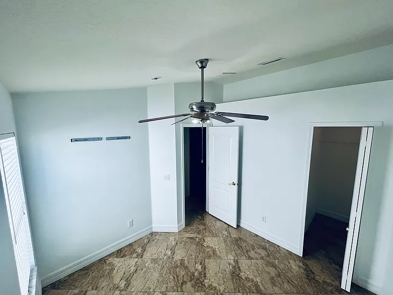 Bedroom 2. Pre mounted wall tv stand. 
Walk-in closet.