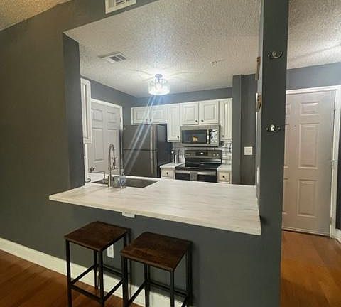 2nd image of 1075 Peachtree Walk NE Unit A302