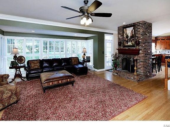 The open floor plan is wonderful for entertaining. The great room shares a fireplace with the breakfast area!