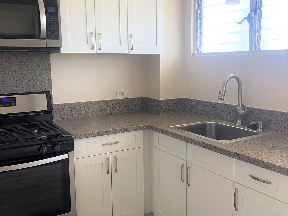 Punahou Heights kitchen area with appliances and cabinets