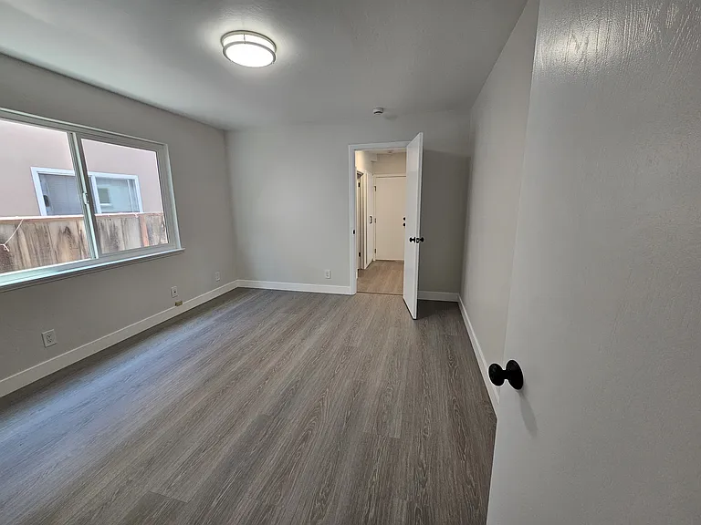 Third walk-through bedroom to be used as den, office or nursery.
