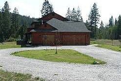 Large, circular drive and beautiful 3+ car garage