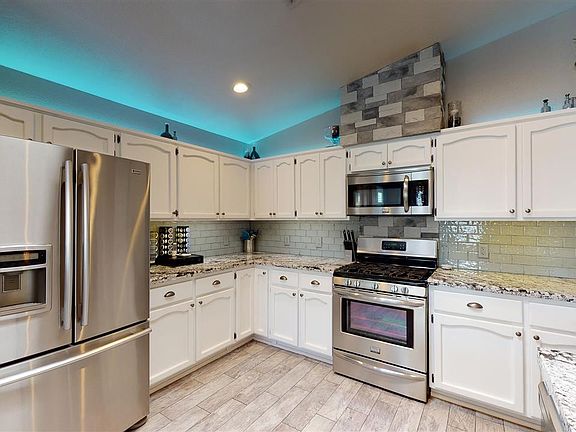 5th image of 10535 E 39th Pl