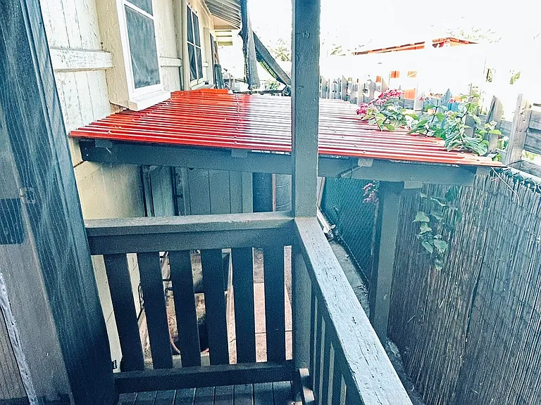 Back stairs to laundry and planting areas