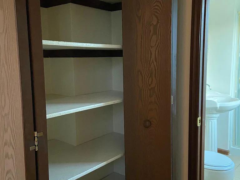Large Master Bedroom linen closet next to Master Bath