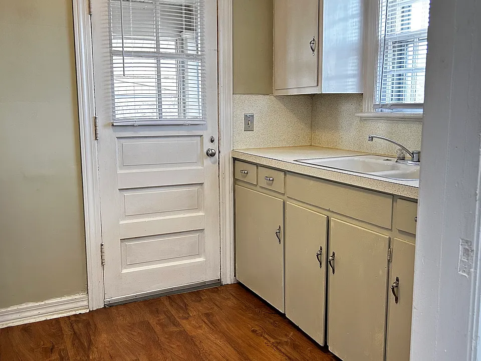kitchen, doorway to screened in porch.