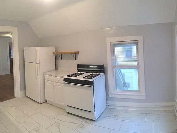 2nd look at the kitchen. Sitting area on right hand side perfect for small table.