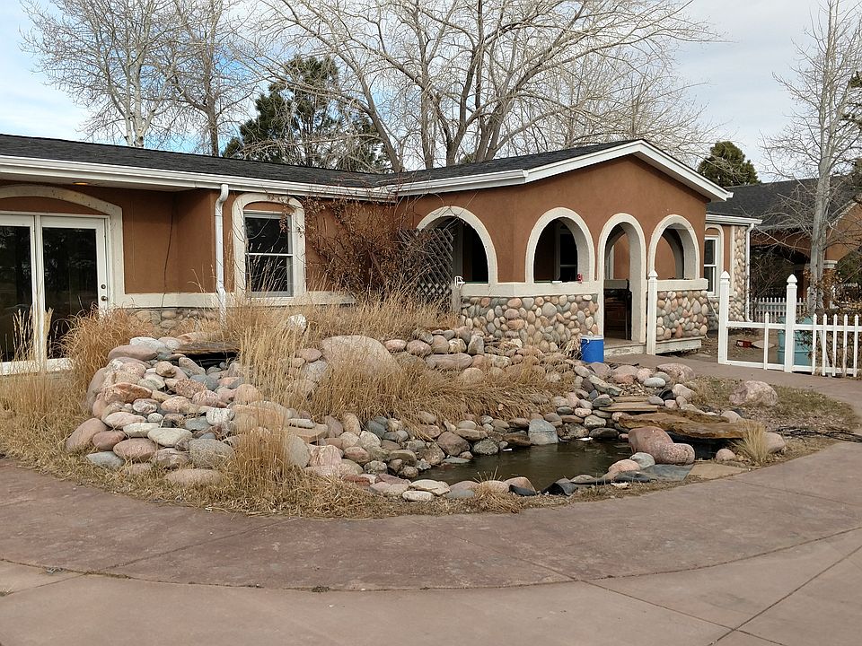 Pond with large driveway!