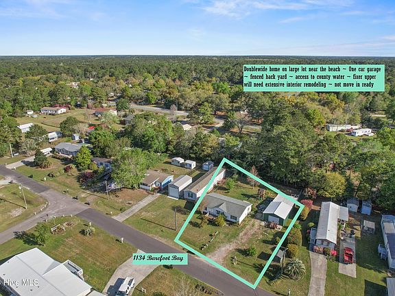 5th image of 1134 Barefoot Bay Place SW