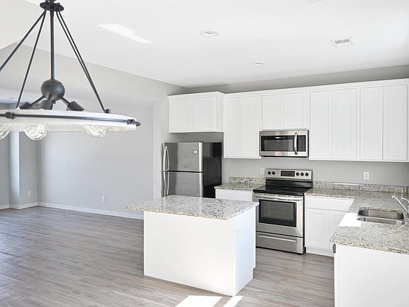 Kitchen with Refrigerator, Stove, Microwave and Dishwasher