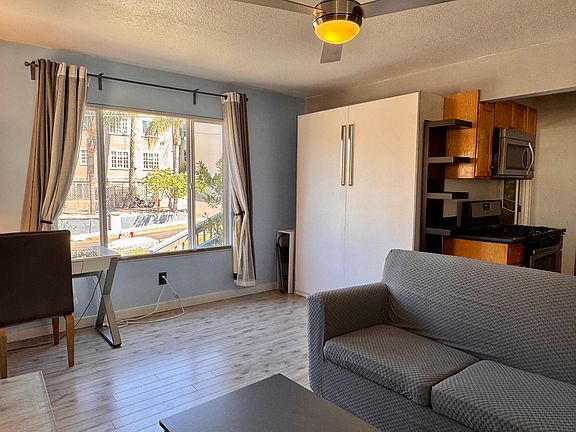 New couch cover (still a pull out sofa bed) - photo taken May 21 2025. Updating with additional photos soon!